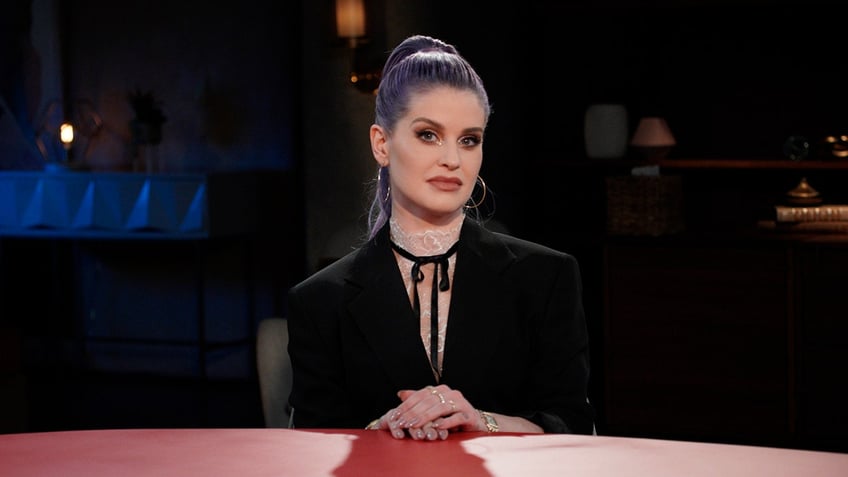 Kelly Osbourne looking at the camera