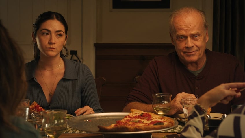 Isabelle Fuhrman and Kelsey Grammer in a scene from "Wish You Were Here."