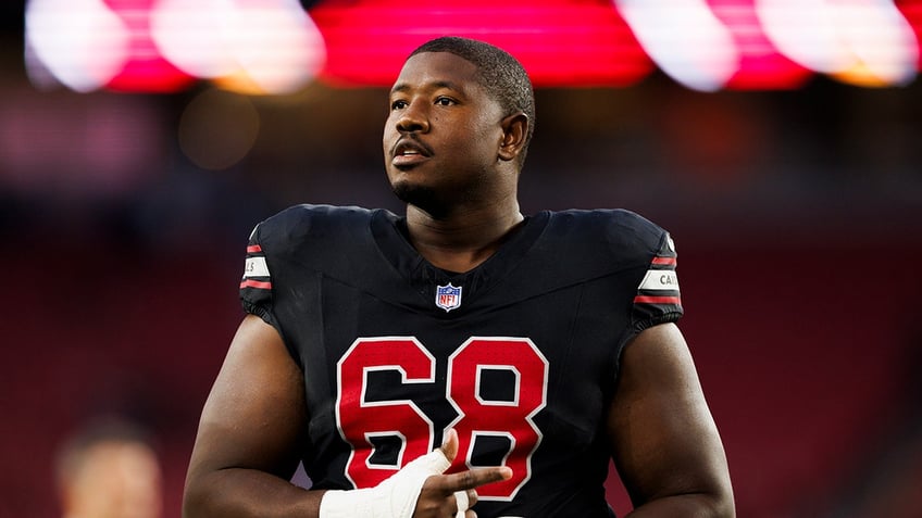 Kelvin Beachum looks on field