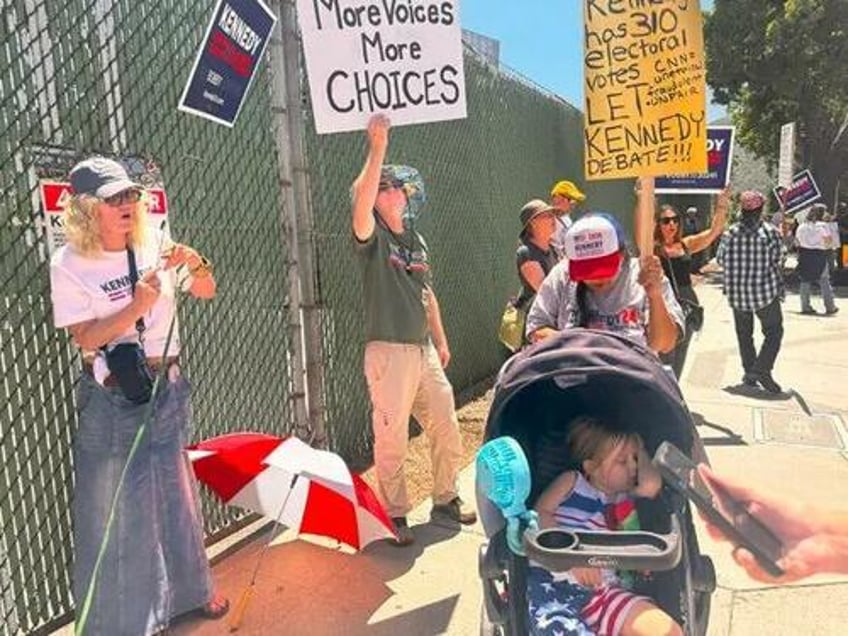 kennedy supporters protest outside cnn office in burbank after he is excluded from debate