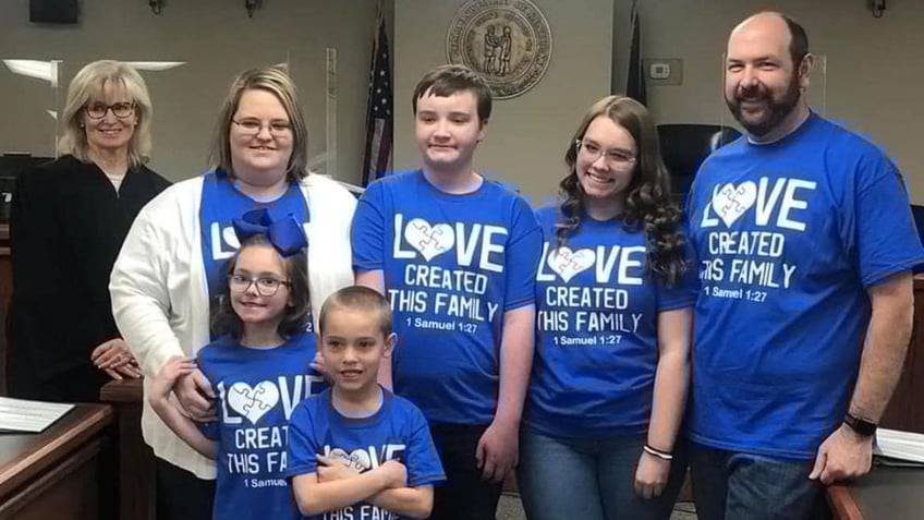 A judge makes it official: Kasey Padgett (second from left) and Justin Padgett (far right) officially adopted their children Jayden, Hailey, Alexis and Jase in March 2022.