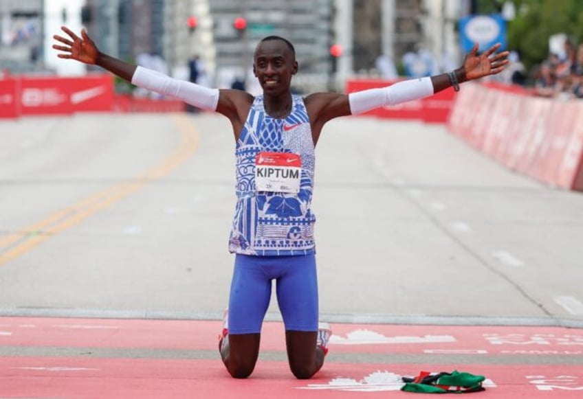 Kenya's Kelvin Kiptum celebrates his world record-shattering victory at the Chicago Marath