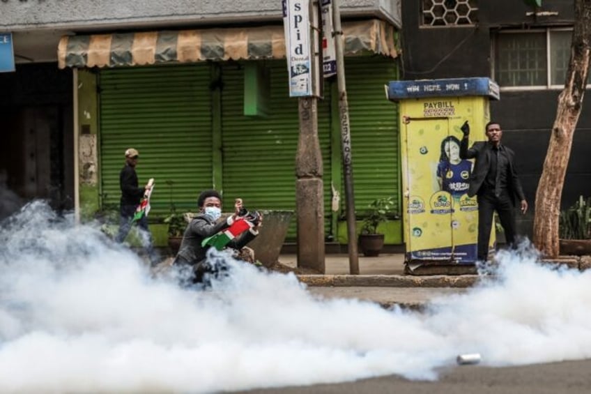 Police fired tear gas at dozens of demonstrators in the capital Nairobi, as anti-governmen