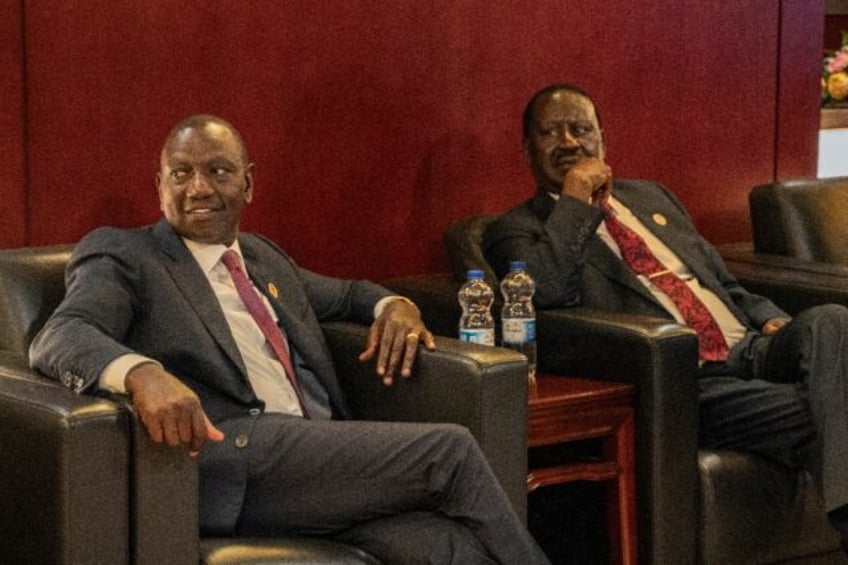 Kenyan President William Ruto (L) and opposition veteran Raila Odinga signed a deal to 'he