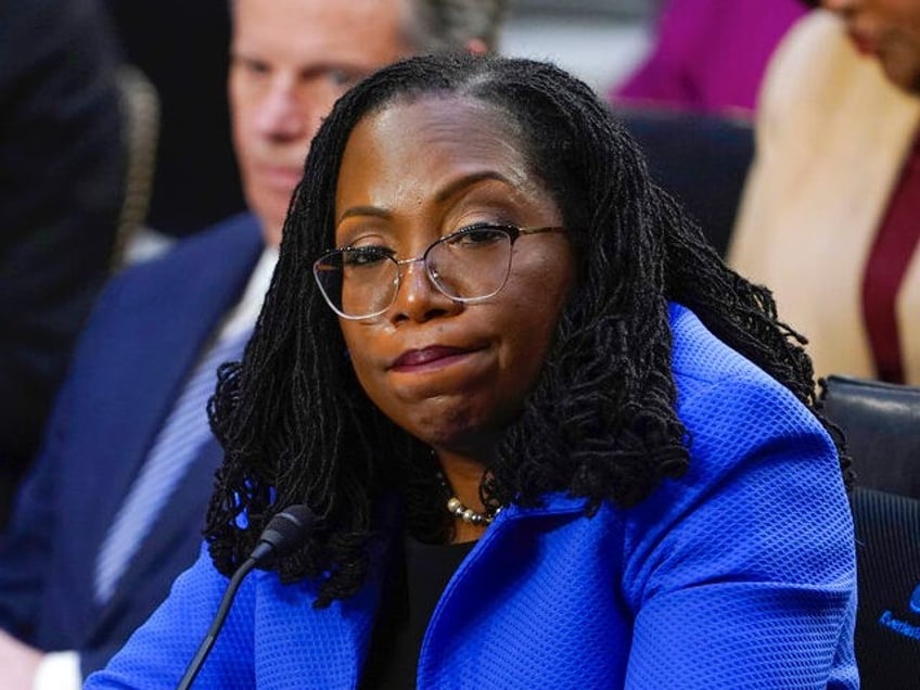 Supreme Court nominee Judge Ketanji Brown Jackson listens as Sen. Josh Hawley, R-Mo., spea