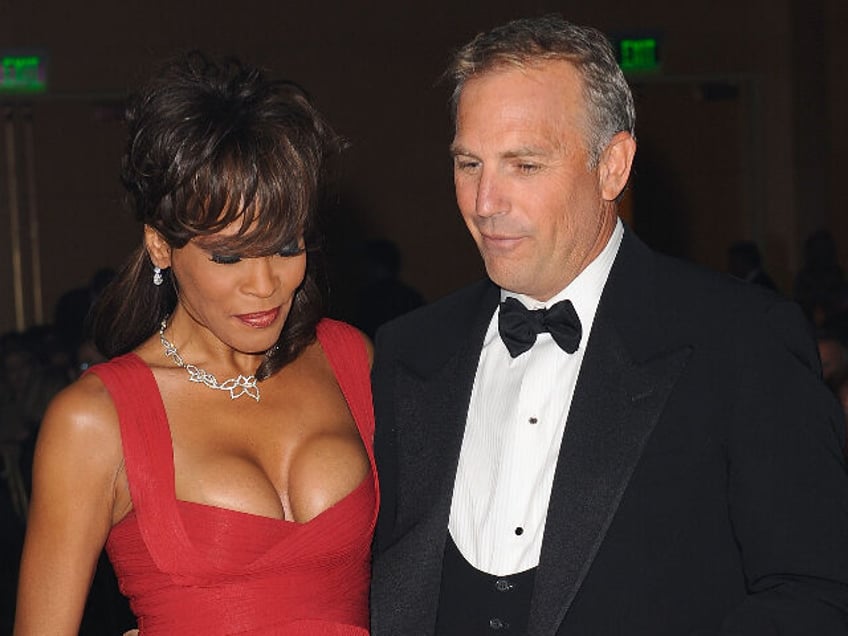 SCOTTSDALE, AZ - APRIL 05: Singer Whitney Houston and actor Kevin Costner at Muhammad Ali&