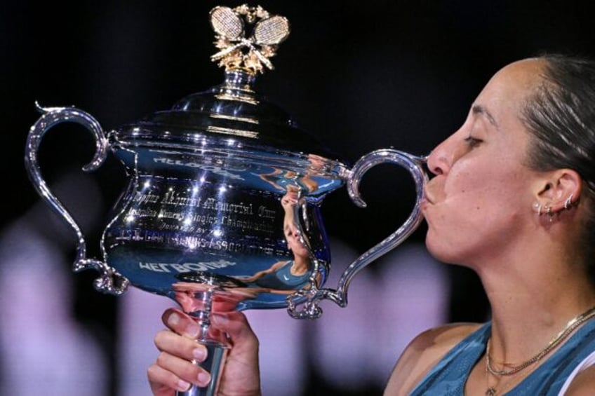 Madison Keys poses with the Daphne Akhurst Memorial Cup after her victory over Aryna Sabal