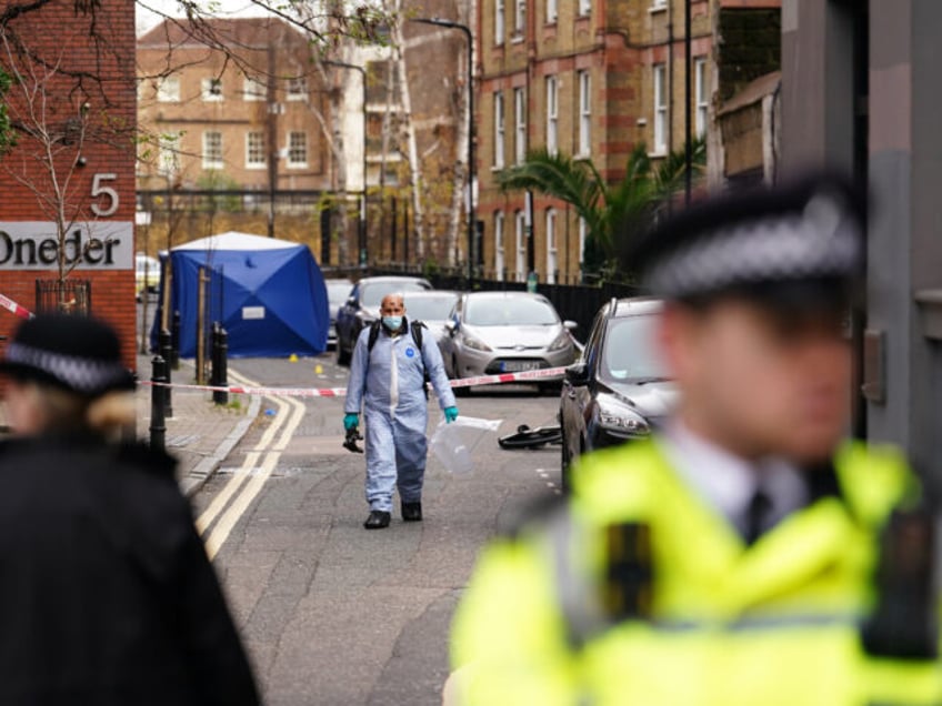 A police forensic officer at a property in Cranwood Street, central London, where a man died from stab wounds in the early hours of this morning. Police were called at approximately 3.10am to reports of a stabbing and attended the property with the London Ambulance Service. Four people - two …