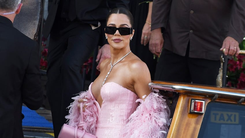 Khloe Kardashian attending Jeff Bezos and Lauren Sanchez wedding.