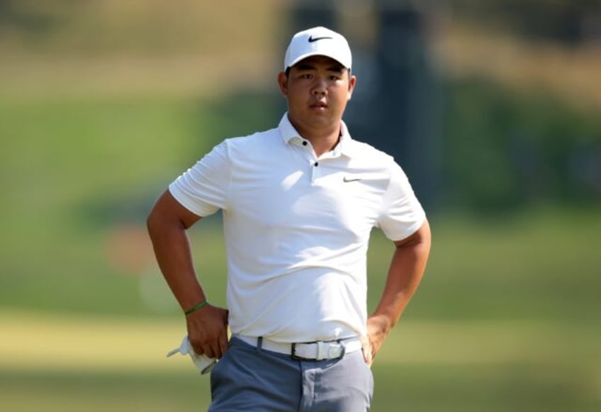South Korea's Tom Kim fired an eight-under par 62 without making a bogey to seize the lead