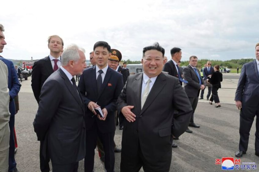 kim jong un arrives in russian port city where he is shown russian nuclear capable bombers