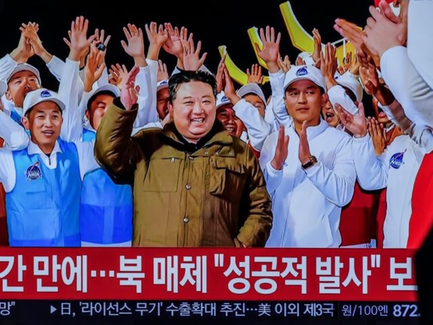 kim jong un celebrates launching spy satellite to closely monitor us imperialists