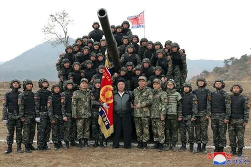 kim jong un drives tank in live fire preparations for war drill