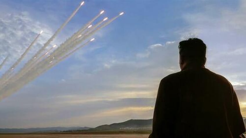 kim jong un oversees massive missile launch preemptive attack drills