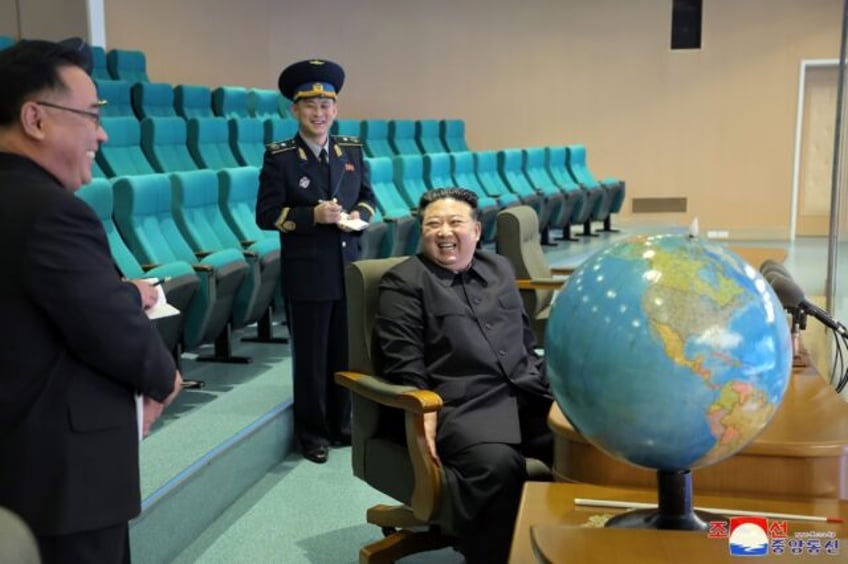 kim jong un reviews satellite photos of s korea target regions state media