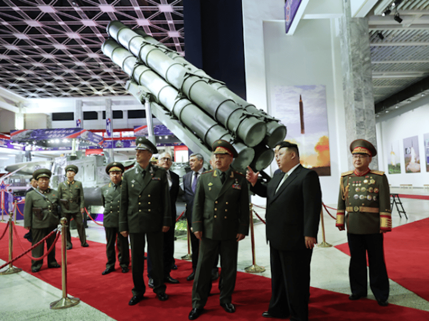 kim jong un shows off icbms drones to russian defense minister in north korea