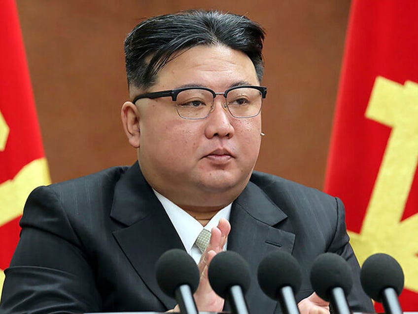 In this photo provided by the North Korean government, North Korean leader Kim Jong Un claps hands during a year-end plenary meeting of the ruling Workers' Party in Pyongyang, North Korea, Tuesday, Dec. 26, 2023. Kim praised what he called achievements and victories that strengthened national power and boosted the …