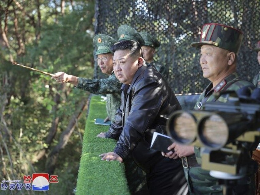 In this photo provided by the North Korean government, North Korean leader Kim Jong Un, ce