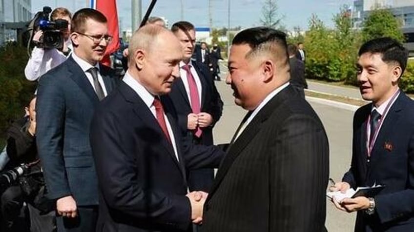 kim jong un toasts putin wishing great victory over enemies