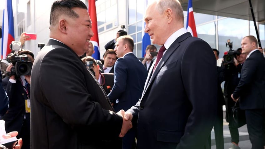 kim jong un vows full support for putins sacred struggle in arms meeting