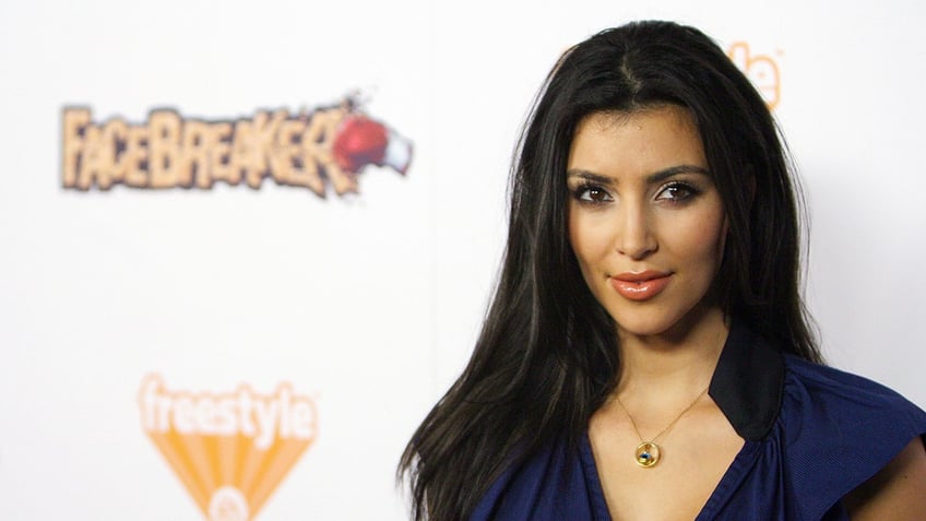 Kim Kardashian in 2008 on a red carpet