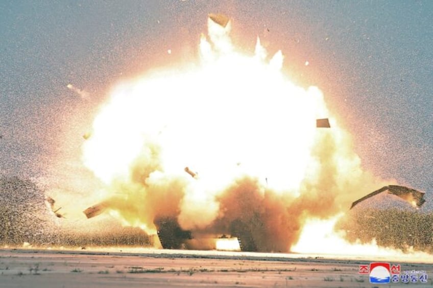 A Korean Central News Agency (KCNA) photo from August 26 shows a target exploding during a