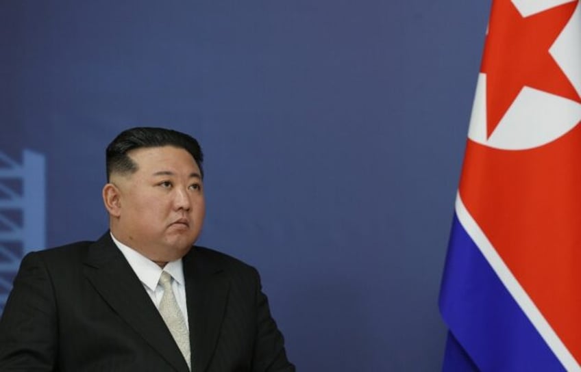 kim visits military aviation plant in russias far east