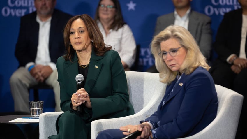 Kamala Harris, left, with Liz Cheney, right, at town hall