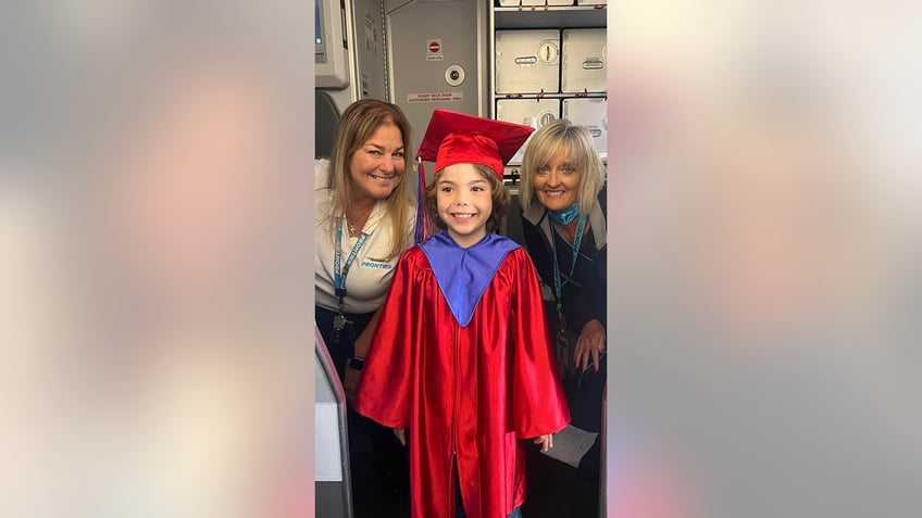 Xavier with flight attendants