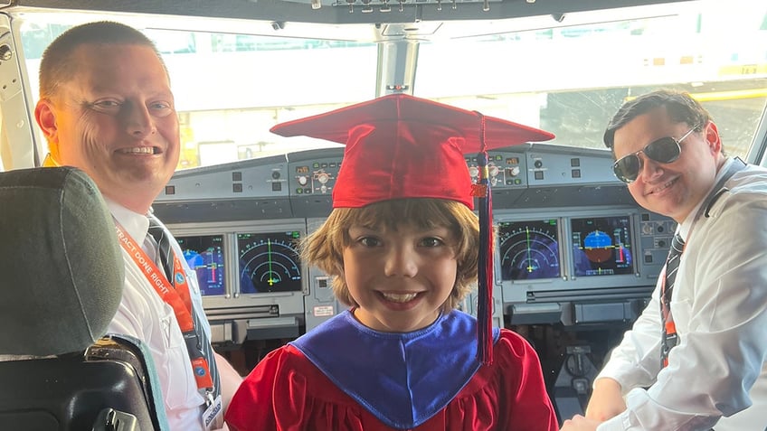 Xavier with pilots in cockpit