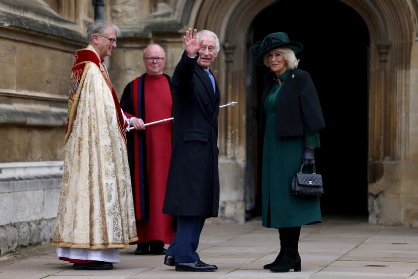 TOPSHOT - Britain's King Charles III (2nd R) and Britain's Queen Camilla (R) arrive at St. George's Chapel, Windsor Castle, to attend the Easter Mattins Service, on March 31, 2024. (Photo by Hollie Adams / POOL / AFP) (Photo by HOLLIE ADAMS/POOL/AFP via Getty Images)