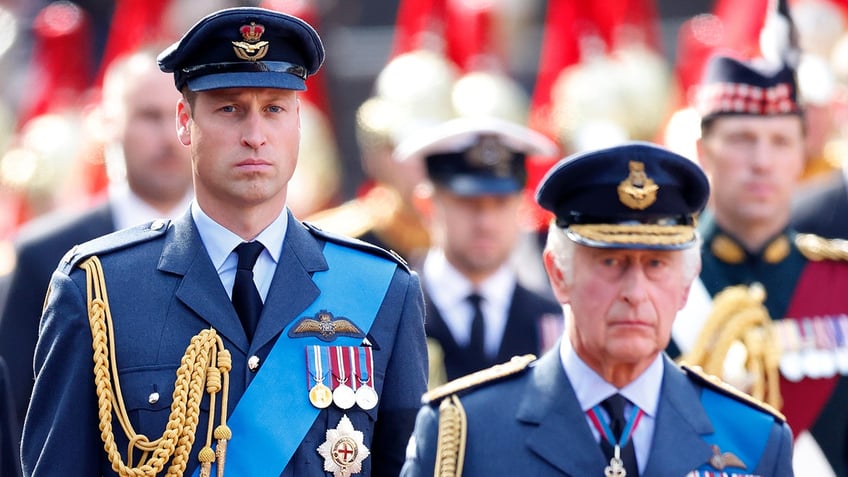 Prince William standing behind his father, King Charles III, at Queen Elizabeths funeral, in September 2022.