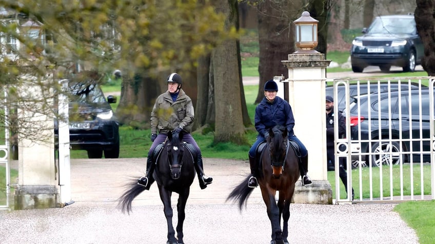 Prince Andrew on horseback with a companion.