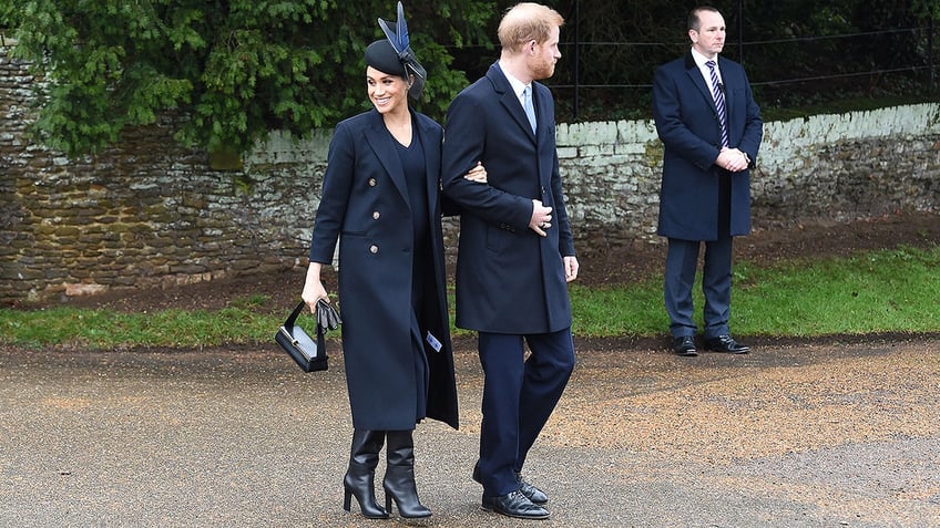 Meghan, Duchess of Sussex and Britains Prince Harry, Duke of Sussex, depart after the Royal Familys traditional Christmas Day service at St Mary Magdalene Church in Sandringham, Norfolk, eastern England, on December 25, 2018. (Photo by Paul ELLIS / AFP) (Photo credit should read PAUL ELLIS/AFP/Getty Images)