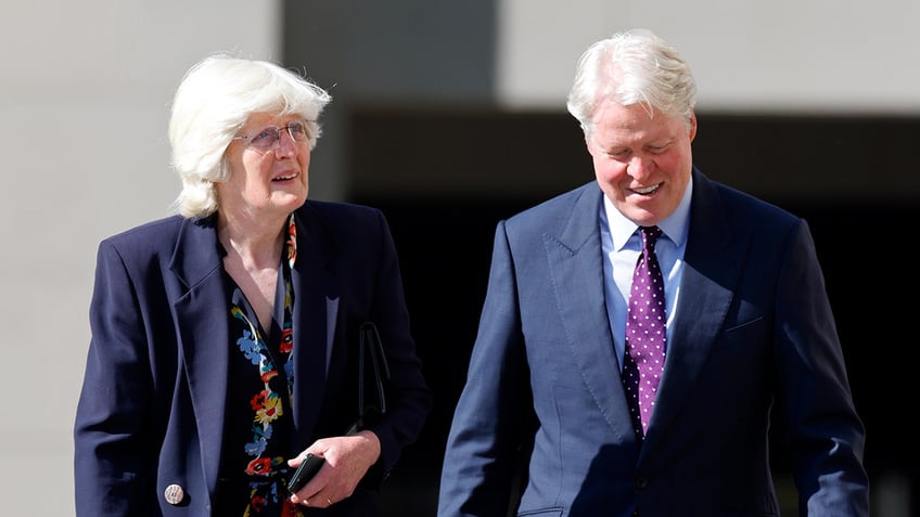 Lady Jane Fellowes and her brother Earl Charles Spencer walking together all smiles.