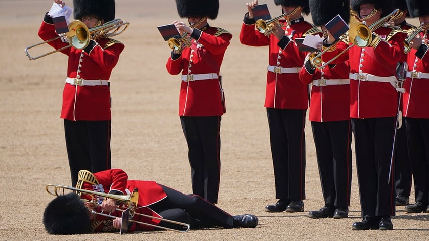 Trombonist on ground