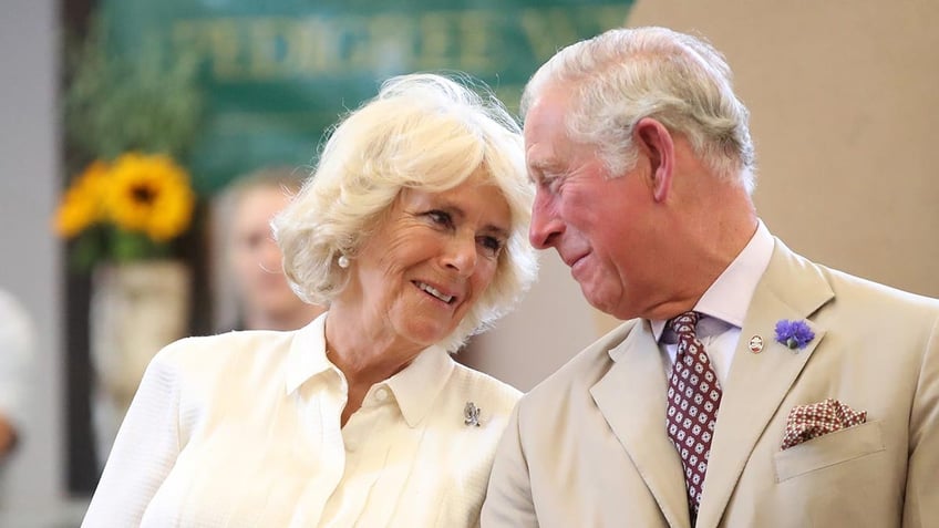 Camilla smiling at Charles