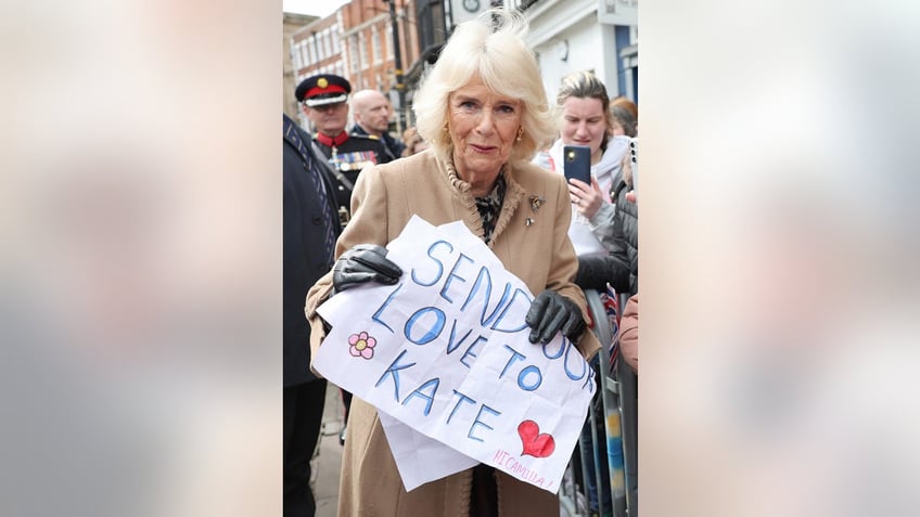 Queen Camilla holds a heartfelt sign for Kate Middleton