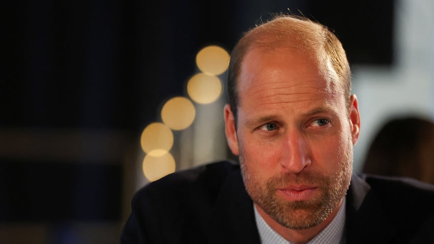 A close-up of Prince William looking pensive.