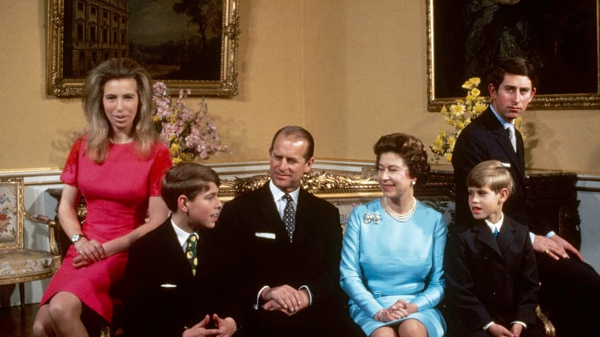 The royal family posing together inside the palace.