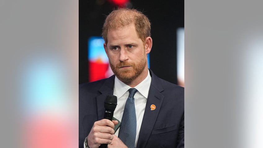 Prince Harry looking somber