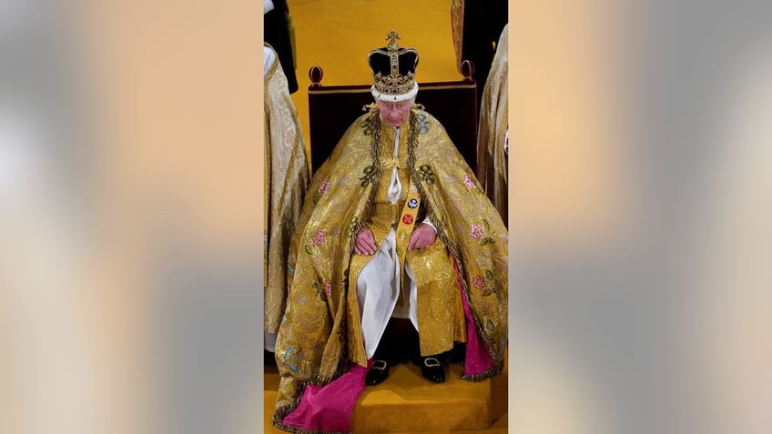 King Charles III receives The St Edwards Crown during his coronation ceremony in Westminster Abbey