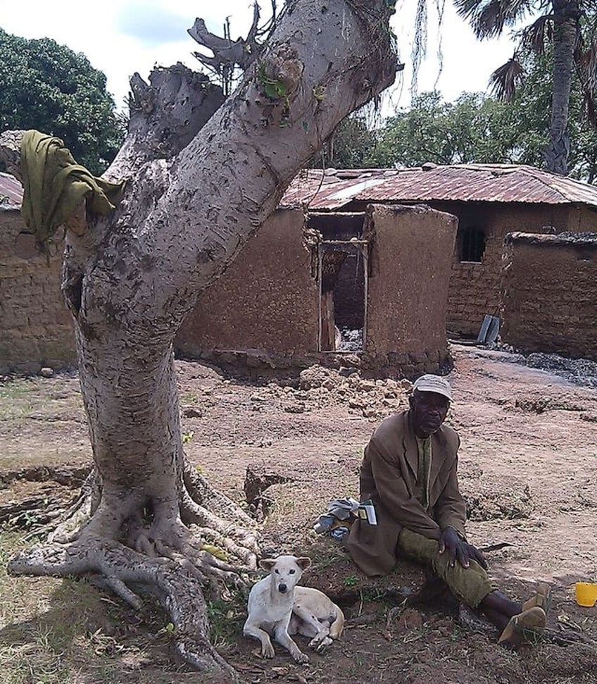 A villager and his dog in a Christian community terrorized by jihadists in Nigeria