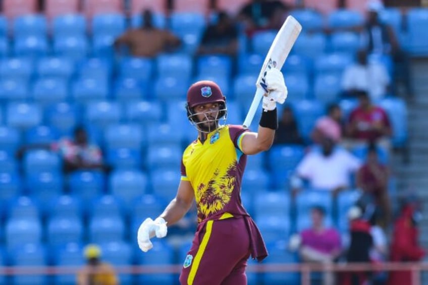 Brandon King celebrates his half century en route to an unbeaten 82 for West Indies in the second T20 international against England on Thursday