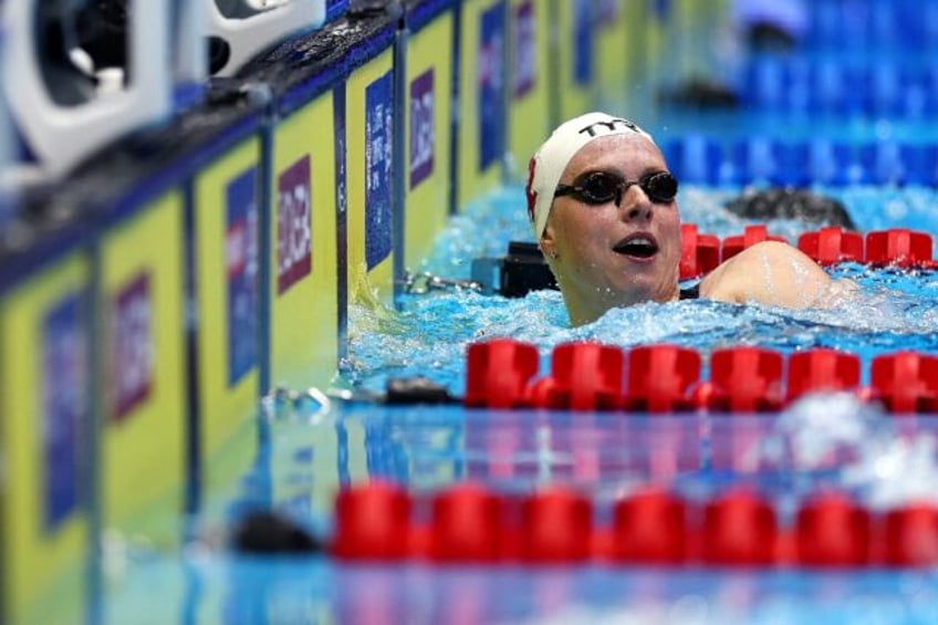 Lilly King reacts after winning the 100m breaststroke at the US Olympic swimming trials