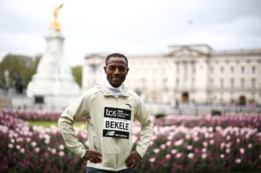 Ethiopia's Kenenisa Bekele poses in front of Buckingham Palace