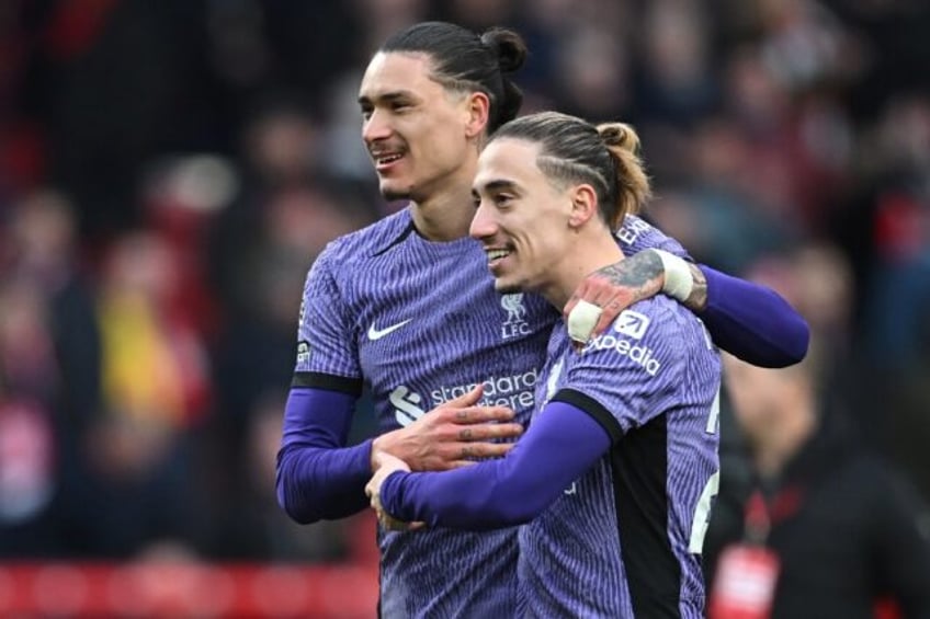 Liverpool's Darwin Nunez (L) and Kostas Tsimikas celebrate their win at Nottingham Forest