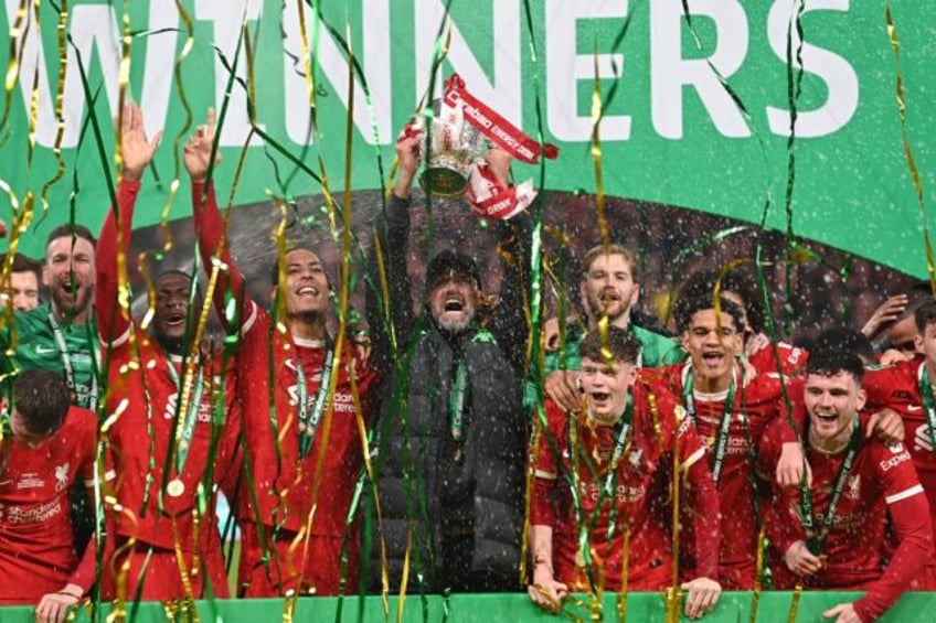 Liverpool celebrate beating Chelsea in the League Cup final