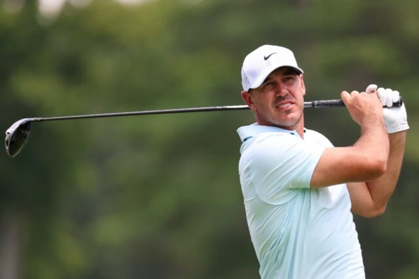 Brooks Koepka of the United States defeatd Spain's Jon Rahm with a par on the first playof