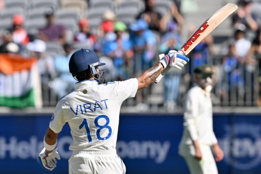 India's Virat Kohli roared back to form with a century against Australia